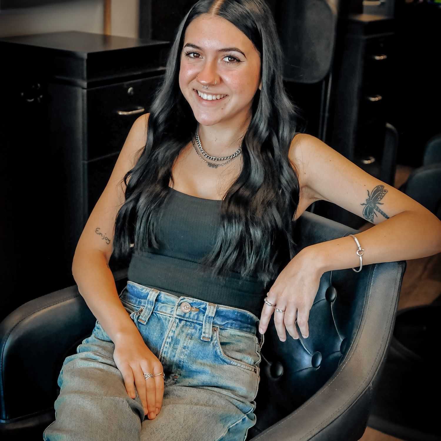 Portrait of Jamie, a professional stylist at D & S Styling, showcasing their expertise and style.